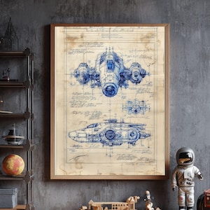 May include: A framed print showing blue technical drawings of a spacecraft, resembling blueprints. The design is on aged paper, with multiple views of the craft. The print is in a wooden frame, ideal for interior decoration.
