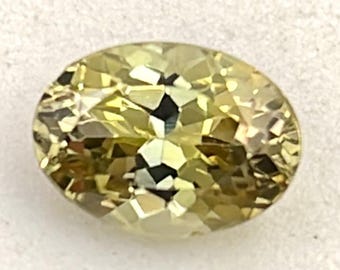 Goldfarbener, natürlicher, unbehandelter Tansanit, 7 x 5 mm, oval geschliffen, facettiert, loses Edelstein, Gewicht: 1,02 ct, Zoisit-Tansanit #1185