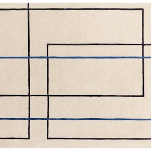 May include: A rectangular rug with a cream background. It features a geometric design of black and blue lines forming overlapping rectangles and squares. The design is modern and minimalist, suitable for a living space.