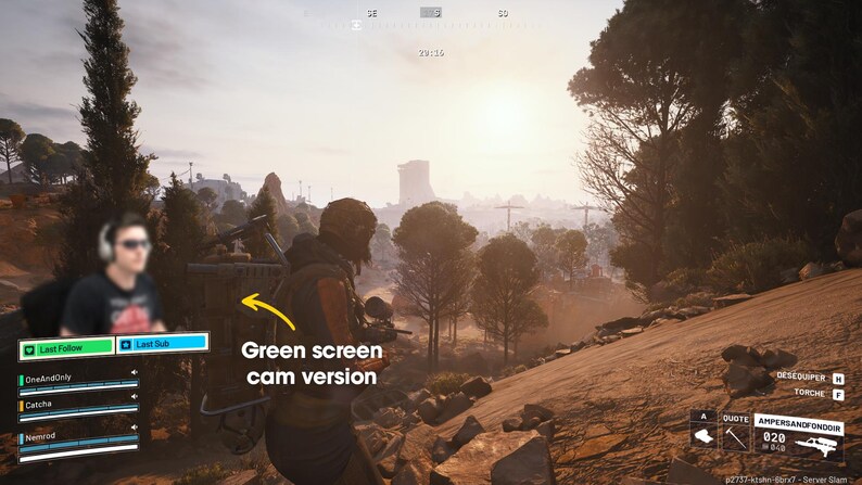 May include: A screenshot from a video game featuring a first-person perspective of a character in a combat scenario. The scene is set in a mountainous, outdoor environment with a bright sun. A small inset shows a person wearing headphones.