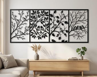May include: A black metal wall art piece featuring four panels with tree and bird designs. The artwork depicts various birds perched on branches with leaves. The piece is mounted on a white wall above a wooden cabinet, adding a touch of nature-inspired decor.
