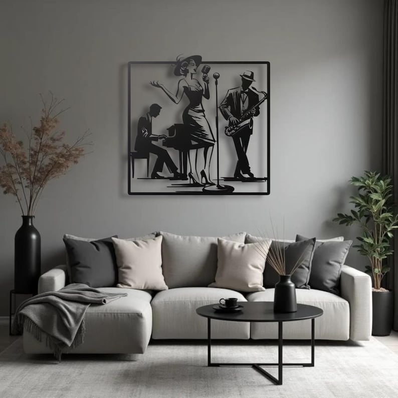 May include: Black metal wall art depicting a jazz band. The artwork features a singer, a saxophone player, and a pianist. The figures are silhouetted against a square frame, creating a stylish and artistic representation of a musical performance.