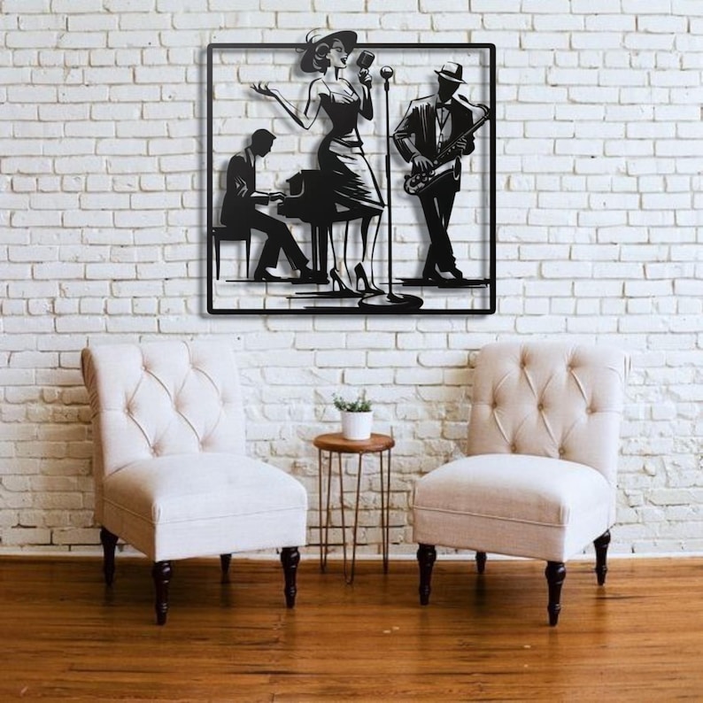 May include: Black metal wall art depicting a jazz band with a singer, pianist, and saxophonist. The figures are silhouetted against a square frame, mounted on a white brick wall. The art piece is displayed above two cream-colored armchairs.