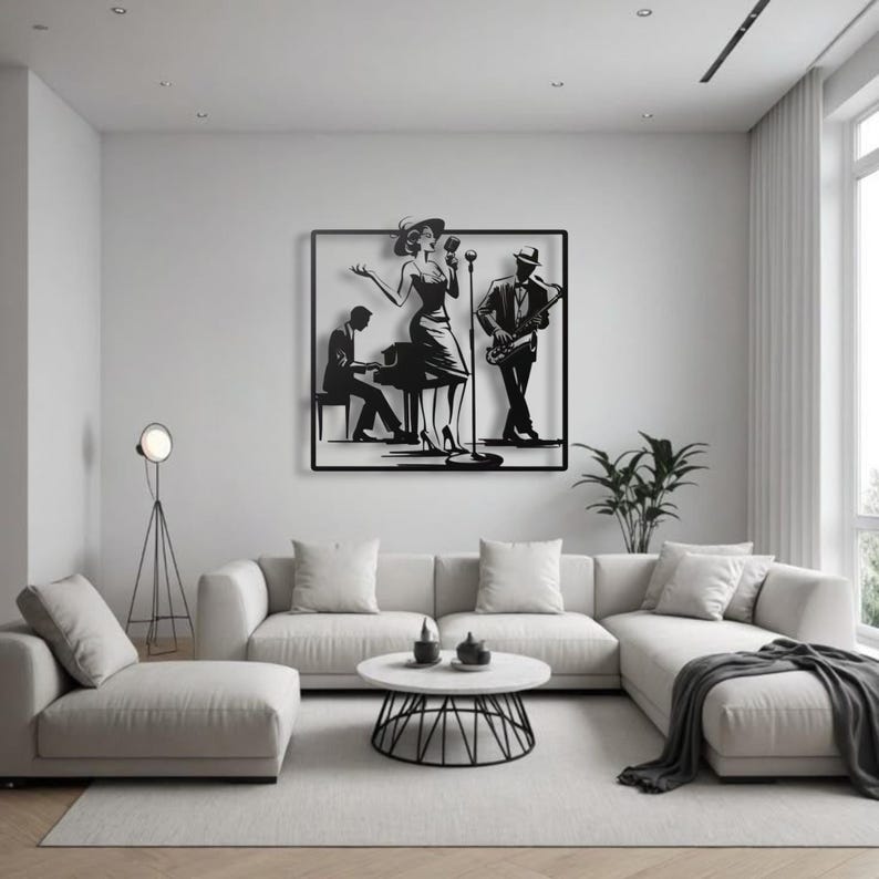 May include: Black metal wall art depicting a jazz band with a singer, pianist, and saxophonist. The artwork is framed and mounted on a white wall above a white sectional sofa in a modern living room setting.