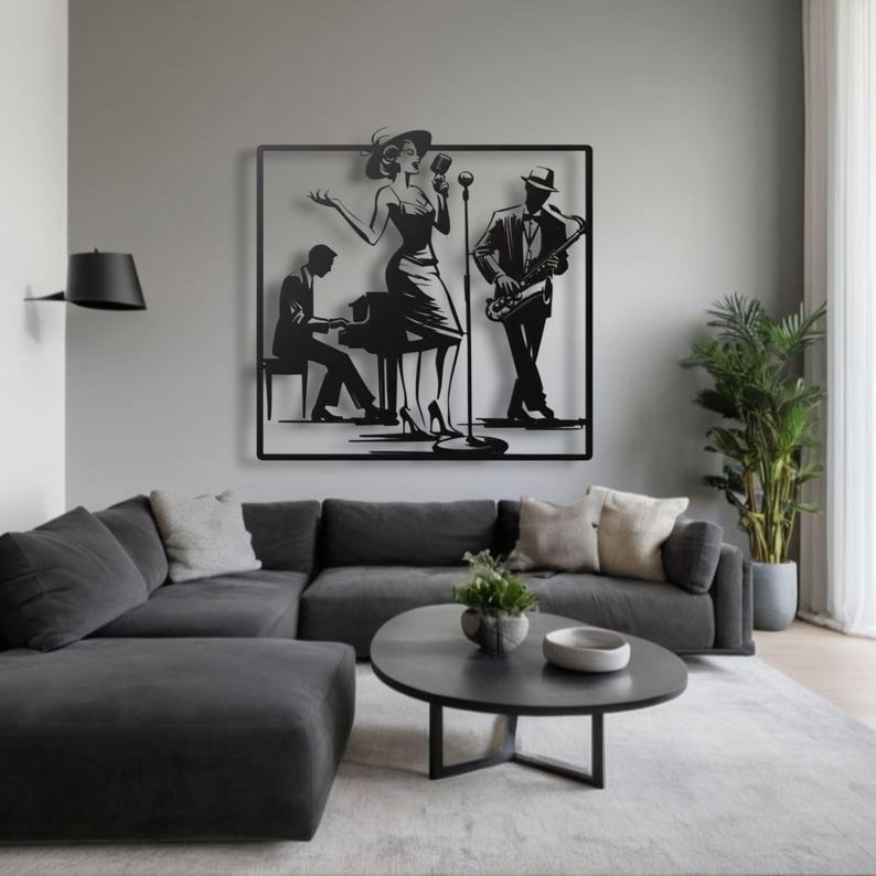 May include: Black metal wall art depicting a jazz band. The artwork features a singer, pianist, and saxophonist within a square frame. The figures are in silhouette against a light gray wall, with a modern living room setting.