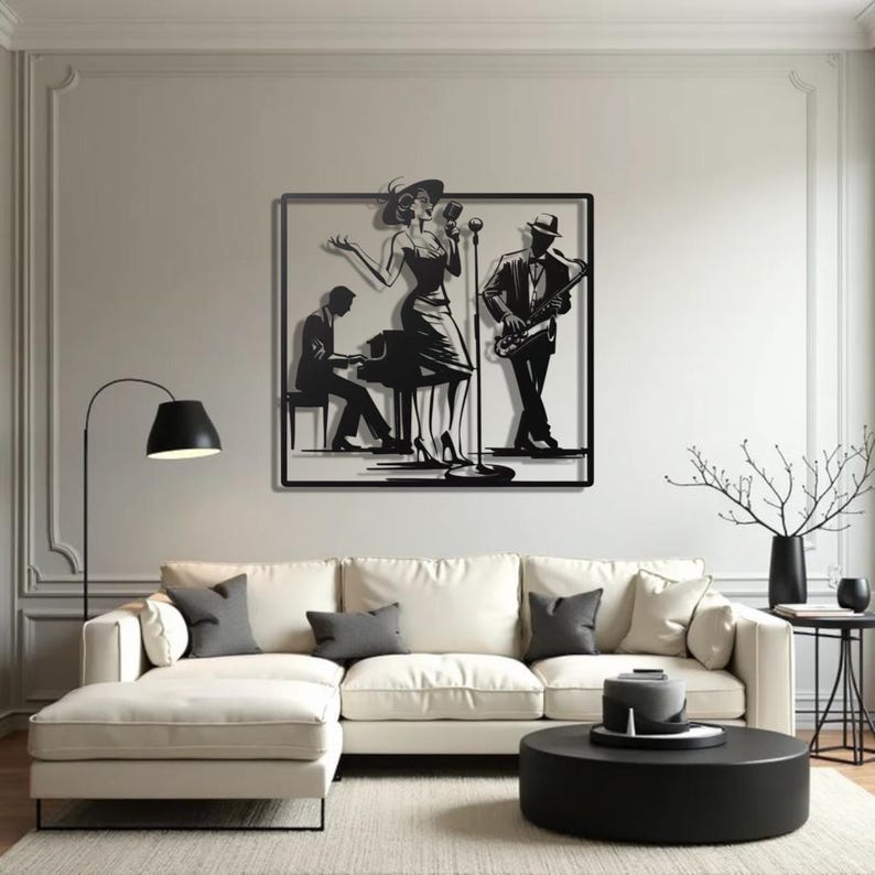 May include: Black metal wall art depicting a jazz band. The artwork features a singer, pianist, and saxophonist. The figures are in silhouette, set against a neutral background. The art is framed and mounted on a wall above a white sectional sofa.