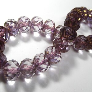 RESTOCKED Czech Glass 10mm x 7mm Faceted Crullers in Transparent Glass with Purple and Golden Bronze Shimmer Finishes 10 jewelry beads 25 Beads Strung