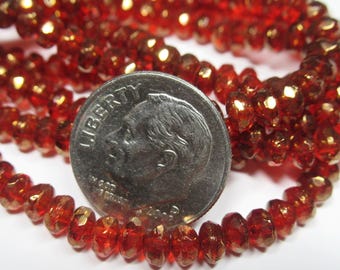 Tiny 3x2mm Ruby Red Czech Glass Faceted Rondelle Jewelry Beads with a Gold Luster (50 beads)