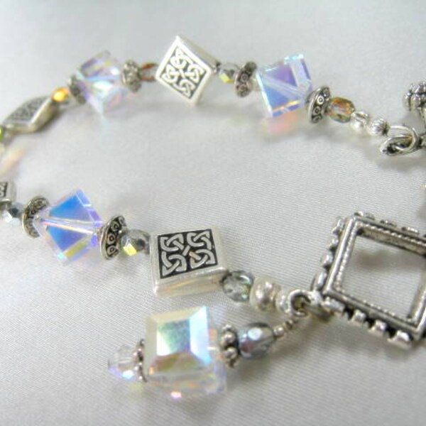 Bracelet with Swarovski Clear Crystal AB Diagonal Cubes and TierraCast Celtic silver beads and square toggle clasp