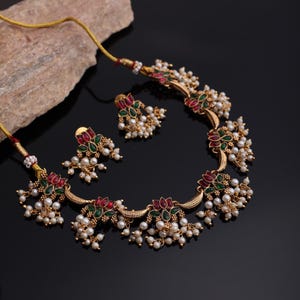 Gold Plated Enamel Lotus Flower Necklace, Flower of Life Necklace | golden jewelry,South Indian necklace Ethnic Red & Green Stone Jewelry