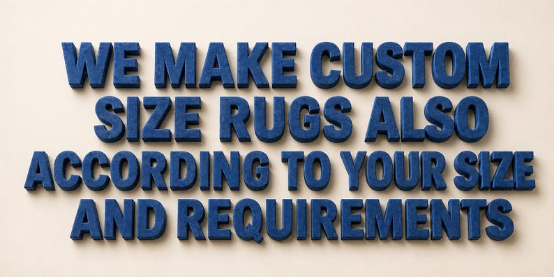 May include: Three-dimensional dark blue block letters arranged in four rows to form the text: WE MAKE CUSTOM SIZE RUGS ALSO ACCORDING TO YOUR SIZE AND REQUIREMENTS. The letters have a textured surface and cast shadows on the light background.