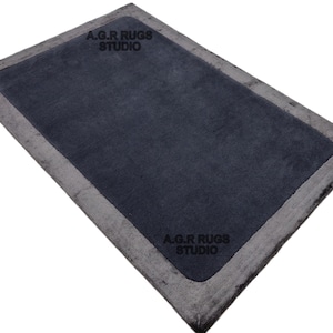 Hand-Tufted Wool Rug: Plain Blue with Silk Border
