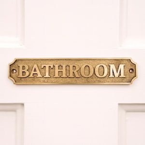 brass bathroom sign

vintage door plaque

shower door sign

WC door plate

rustic home décor

antique brass sign

bathroom wall décor

restroom door sign

toilet door plaque

farmhouse bathroom sign

solid brass plate

old style door sign

bathroom door marker

brass home accessories

retro bathroom plaque

hotel