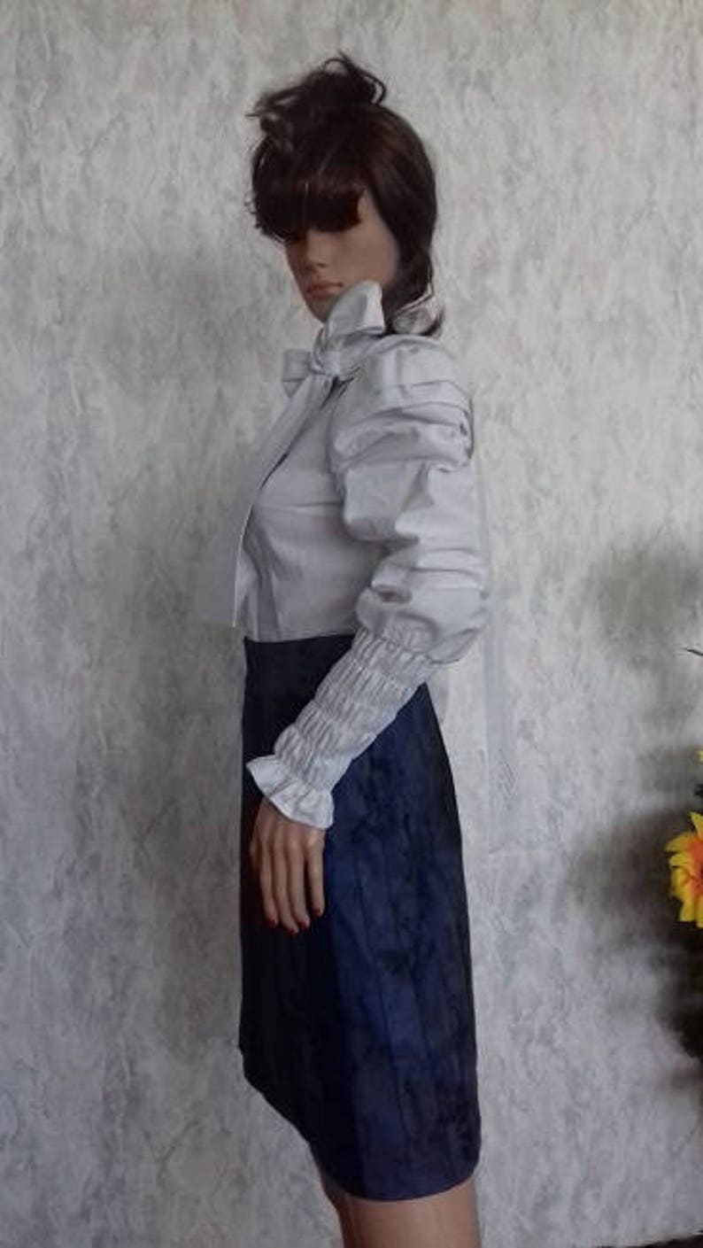 Ladies blue skirt of many pieces made of cotton with elastane.