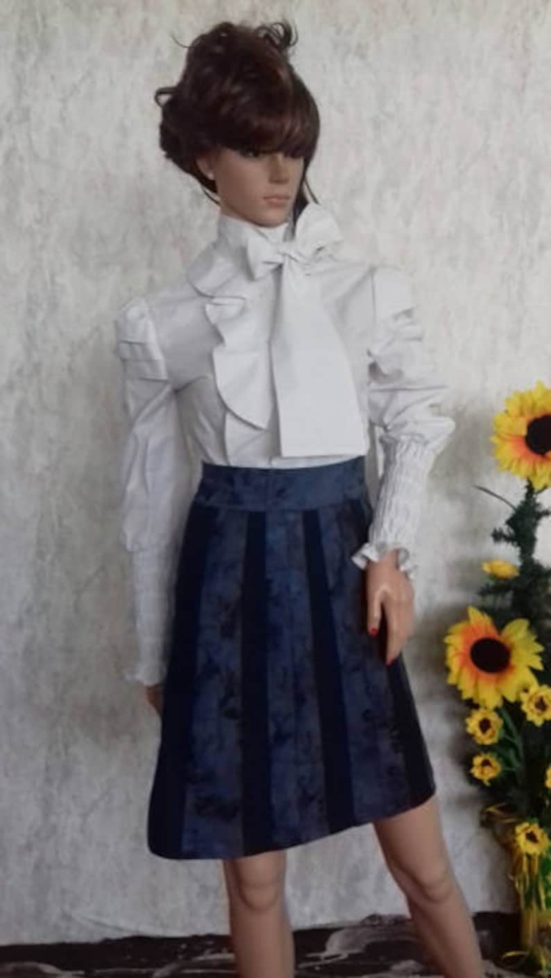 Ladies blue skirt of many pieces made of cotton with elastane.