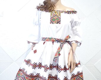 Dress - children's or women's with ethnic motifs