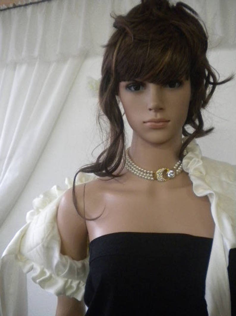 Elegant ladies bolero with lining.
