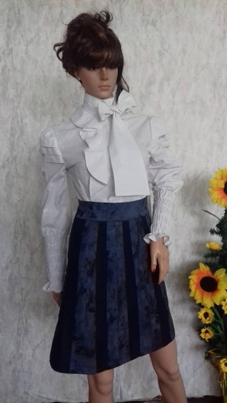 Ladies blue skirt of many pieces made of cotton with elastane.