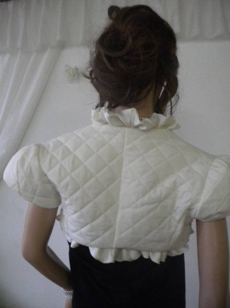Elegant ladies bolero with lining.