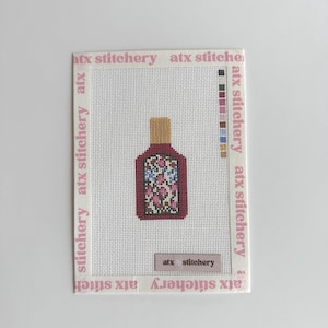 May include: A set of three ceramic nesting bowls in shades of blue, green, and white. The bowls feature a speckled glaze and a simple, modern design. The largest bowl measures approximately 6 inches in diameter.