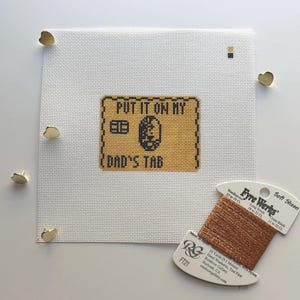 May include: A rustic wooden sign with the text "Welcome to our home" in white lettering. The sign features a distressed finish and a simple, inviting design, perfect for a front porch or entryway.