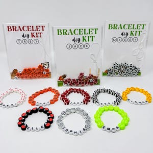May include: DIY bracelet kits with the text "BRACELET diy KIT" and names like "TREY", "JACK", and "MESSI". The image shows finished bracelets in various colors, spelling out names like "ELLE", "SOPHIA", and "EMMA".
