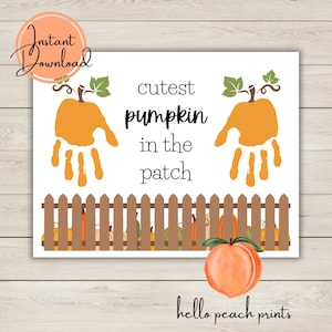 May include: A white sign with the text "cutest pumpkin in the patch" and handprint pumpkins. The sign also features a brown fence and a peach illustration. The words "Instant Download" and "hello peach prints" are also visible.