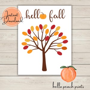 May include: A white print featuring a brown tree with red, orange, and yellow leaves. The words "hello fall" are written in brown script, with a pumpkin graphic above the word "fall". A peach graphic is at the bottom right.