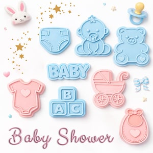 May include: A selection of baby-themed decorations in pink and blue, including a onesie, bib, pram, and blocks spelling "BABY." Other elements include a dummy, teddy bear, and a bunny. The words "Baby Shower" are written in cursive.