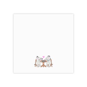 May include: A white square print featuring two cartoon hippos sitting at a small wooden table playing a game of draughts. One hippo wears a black top hat, the other a blue patterned neckerchief. A small pink heart floats above the table.