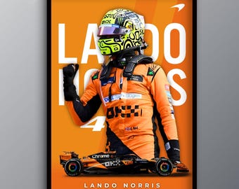 May include: Framed poster featuring Formula 1 driver Lando Norris in his McLaren racing suit. The poster has an orange background with the words "LANDO NORRIS" at the bottom. The image includes a race car and the number 4.
