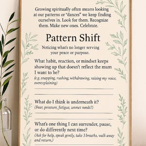 May include: A framed wall art print with a cream background and green botanical illustrations on the sides. The text reads: Pattern Shift, Growing spiritually often means looking at our patterns or dances, and includes reflective prompts for mothers.