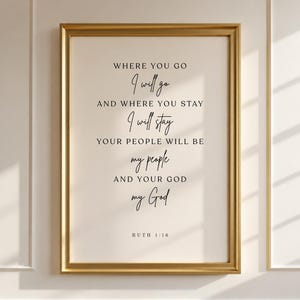 May include: A framed print with a gold-colored frame. The print features elegant black script on a cream-colored background. The text reads, "Where you go, I will go, and where you stay, I will stay..." with the reference "Ruth 1:16" at the bottom.