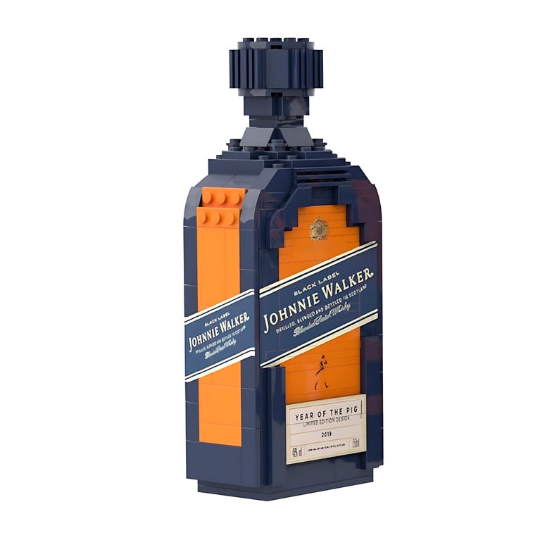 May include: A navy blue and orange block construction of a Johnnie Walker Black Label bottle. The bottle features the Johnnie Walker logo and text, with "Year of the Pig" and "2019" printed on the label. The bottle is a limited edition design.