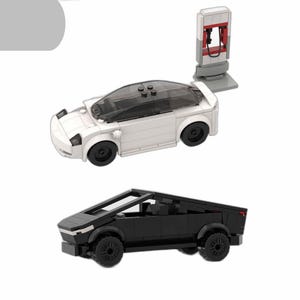 May include: Two toy electric cars, one white and one black, with a charging station. The white car has a sleek design with a transparent roof. The black car has a unique angular shape. The charging station is gray and red.