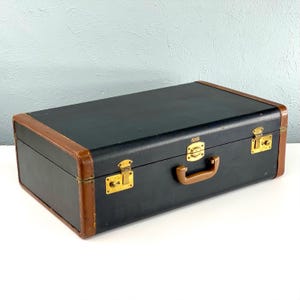 Vintage Large Suitcase with Leather Trim by Blue Arrow