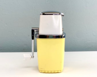 Vintage Swing-A-Way Yellow Ice Crusher