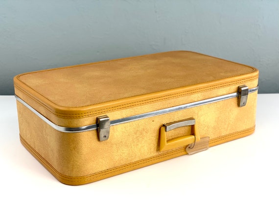 large yellow suitcase