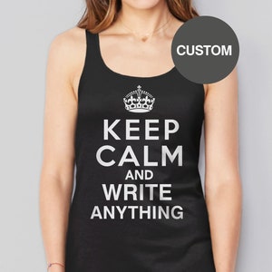 May include: Black tank top with a white crown and the text "Keep Calm and Write Anything".