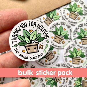 May include: A bulk sticker pack with a white background and green plant illustrations. Each sticker says "Thank you for helping this small business grow".