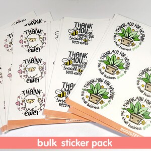 May include: Bulk sticker pack with two different designs. One design features a cute sheep with pink hearts and the text "Thank ewe!" The other design features a potted plant with the text "Thank you for helping this small business grow!"