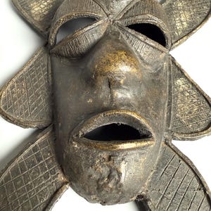 Detailed African bronze mask face vintage tribal wall art decor