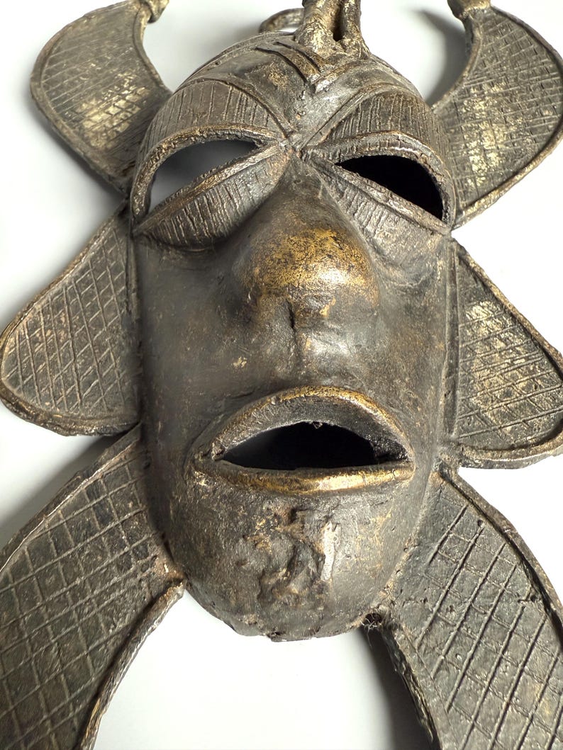 Detailed African bronze mask face vintage tribal wall art decor