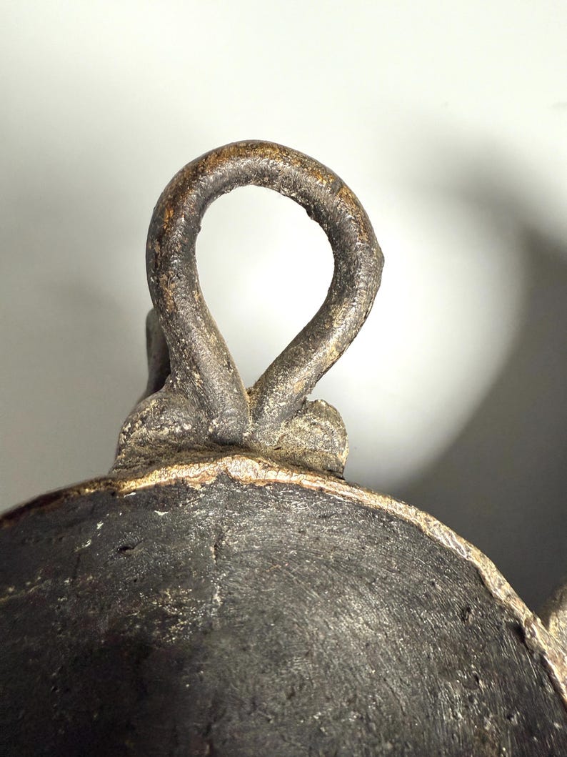 Hanging loop detail African bronze mask tribal vintage decor