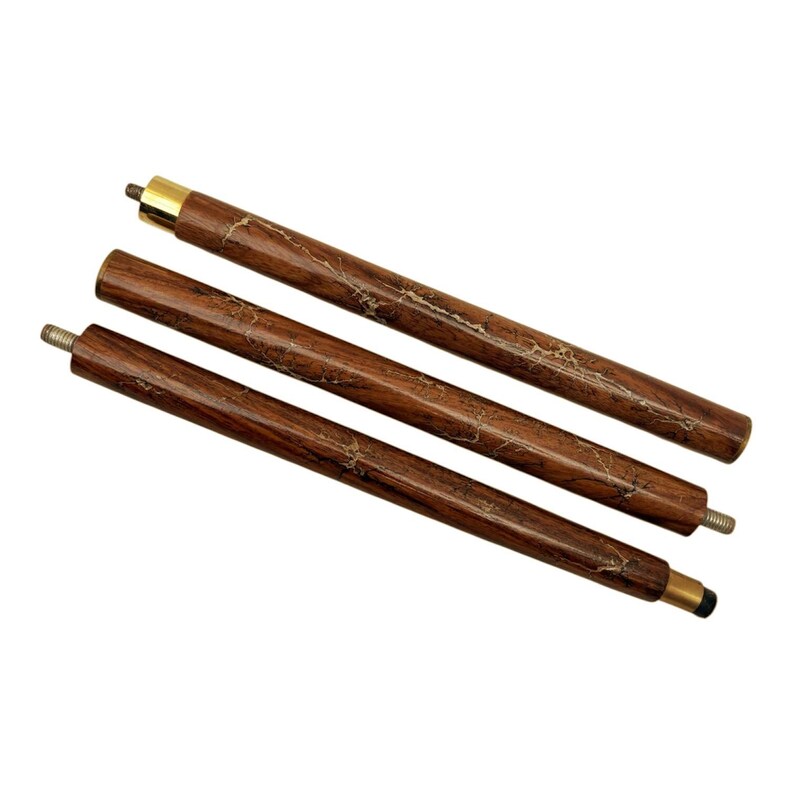 May include: Three wooden walking cane sections with a dark brown finish and a light, marbled pattern. The sections have brass-colored metal accents and threaded ends for assembly. The cane sections are angled across a white background.
