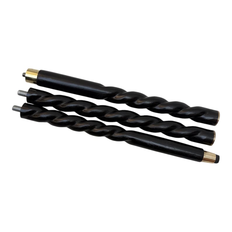 May include: Three black wooden cane shafts with a spiral design. The shafts have brass-colored metal tips and screw threads on the ends. The cane shafts are set against a white background.