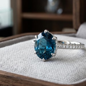 Oval Blue Topaz Solitaire Bezel Ring, 14k Gold Stackable Band