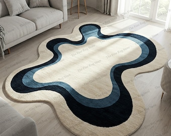 Alfombra de lana tejida a mano, diseño abstracto ondulado, beige y azul.