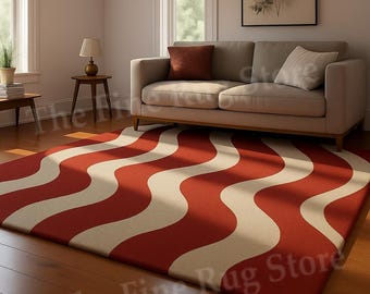 Alfombra de lana tejida a mano con rayas onduladas rojas y beige.