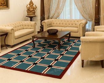 Alfombra de lana tejida a mano, con estampado de cuadrícula azul y borde rojo.